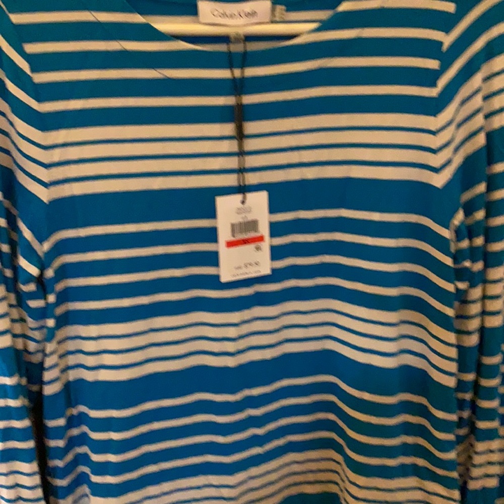 This is a really nice woman’s shirt Calvin Klein name brand